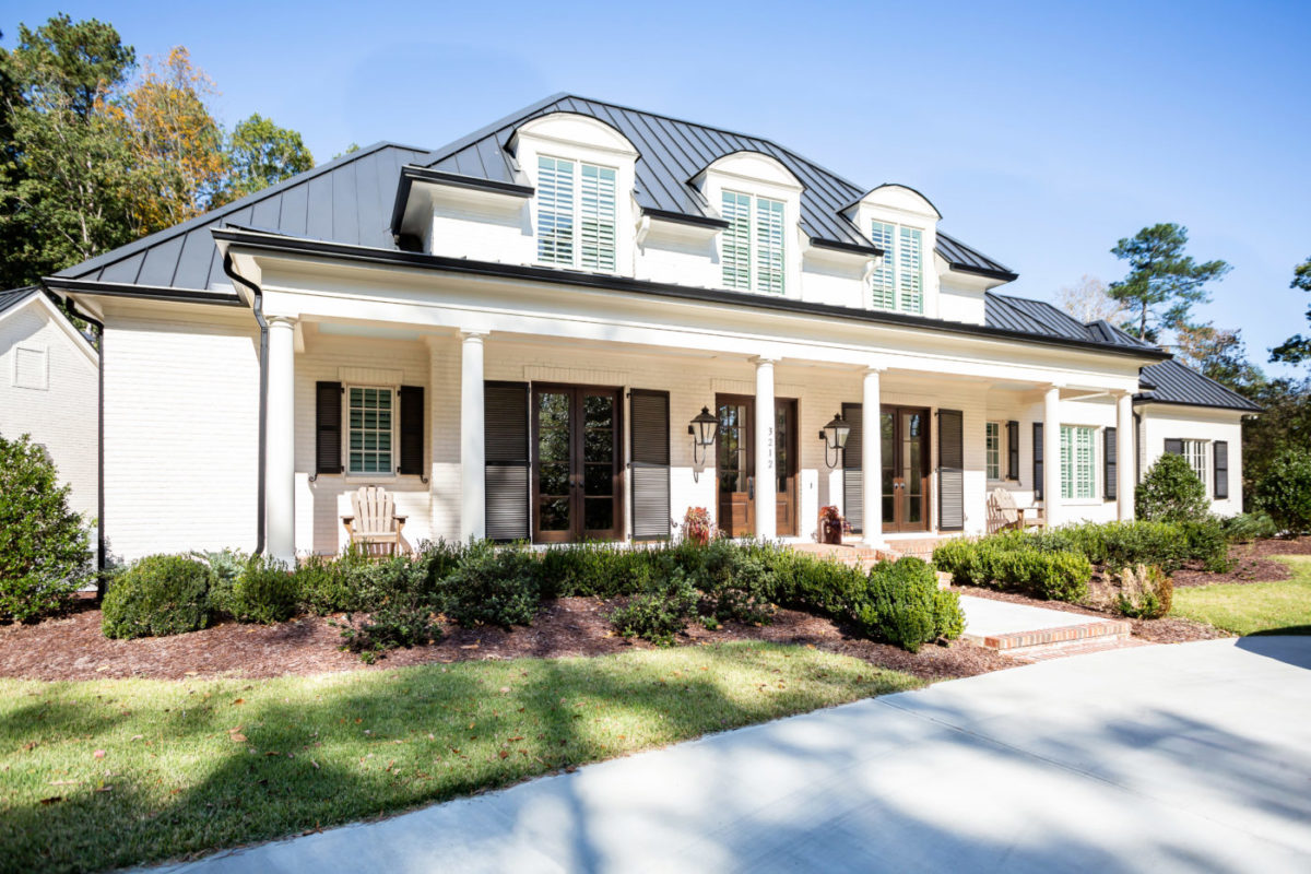 White brick custom luxury home inside the beltline of Raleigh, NC