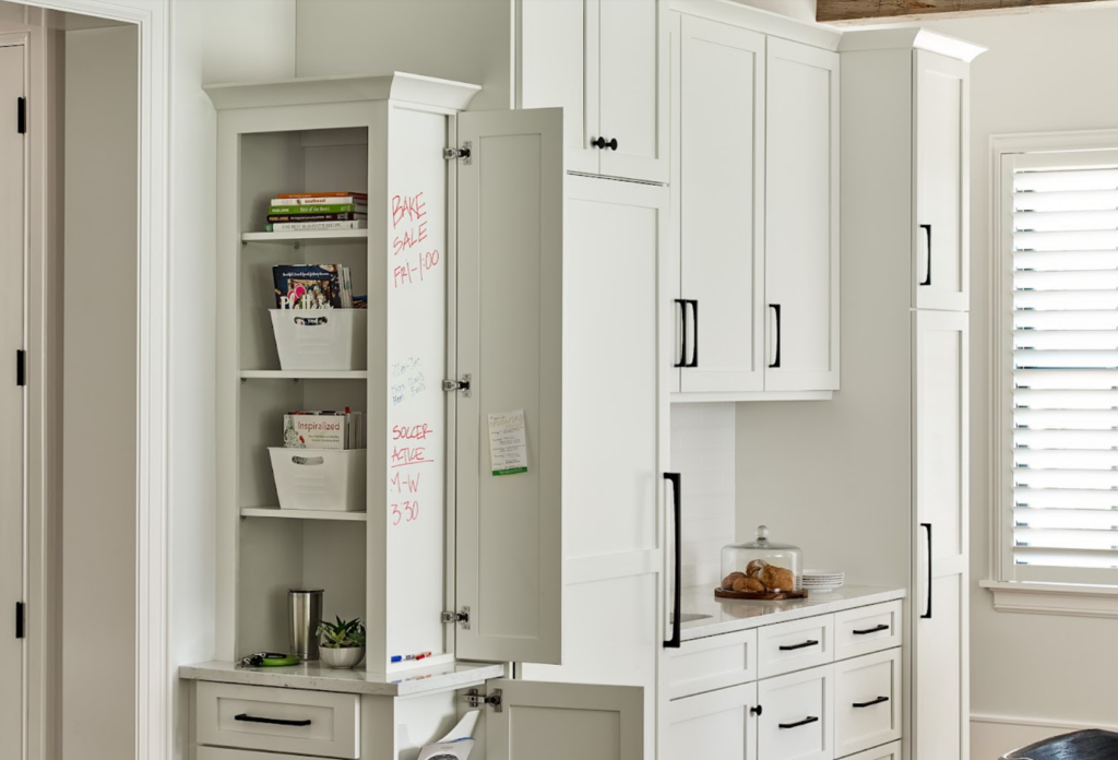 kitchen with an organizational hub attached to a cabinet
