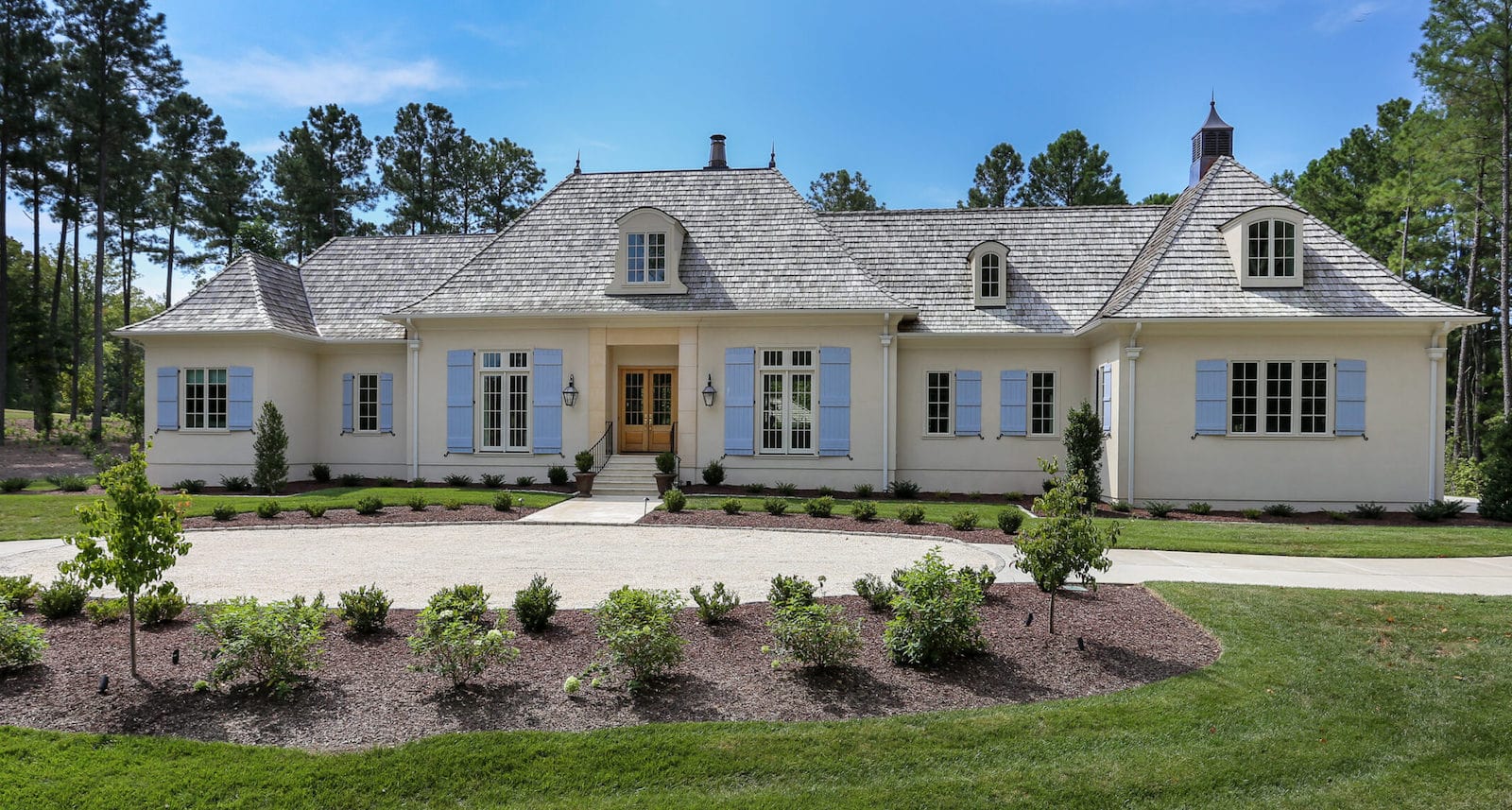 large custom luxury built house in Apex with a round about driveway